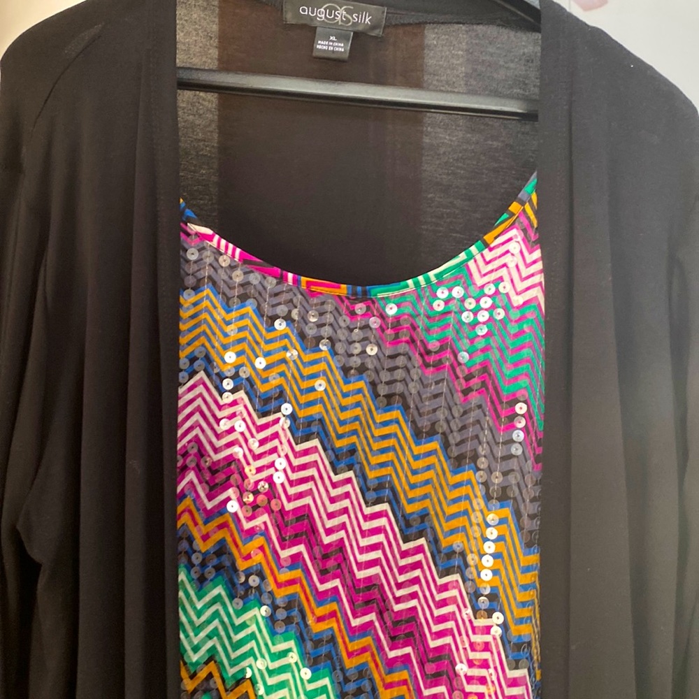 Vibrant colored tank with attached black long sleeve “jacket”